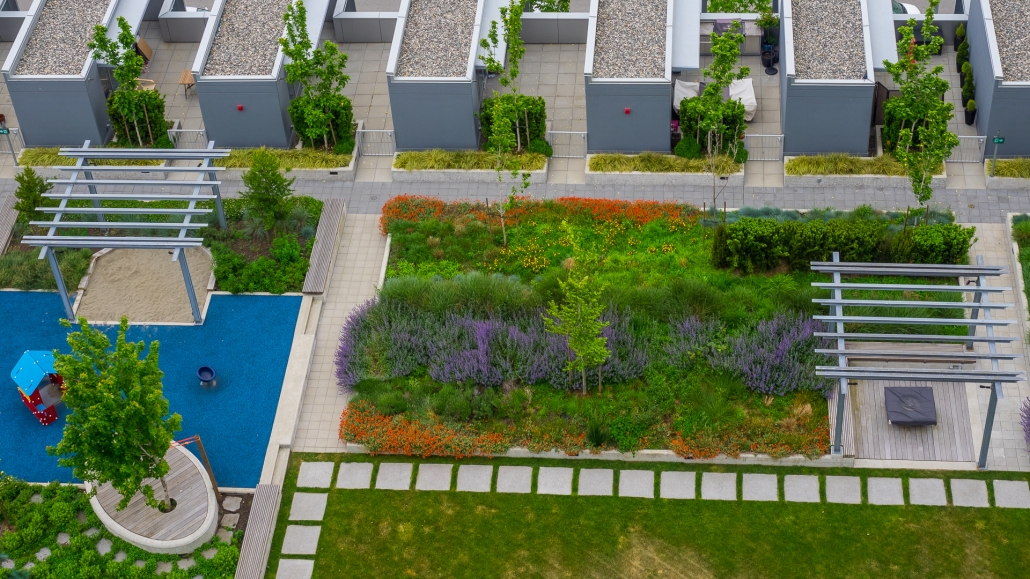 Aerial view of Isidore Landscapes project showing lush garden design with natural stone pathways