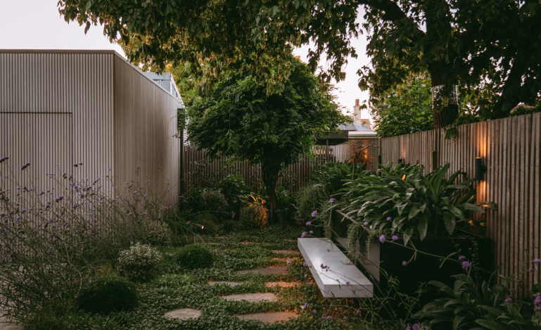 Modern water feature with reflecting pool designed by Sylvita Landscaping